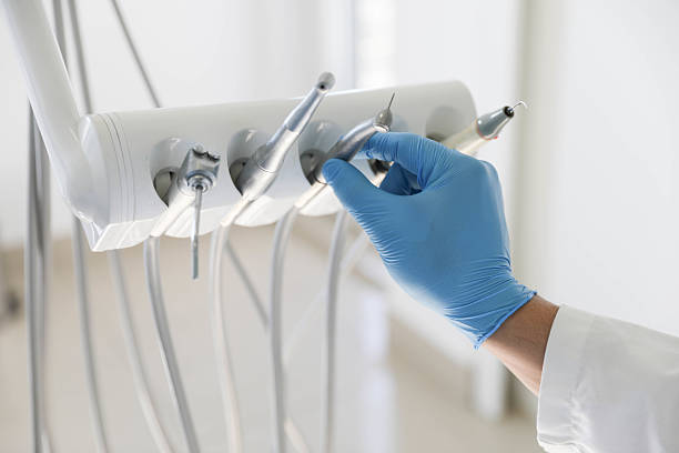 Professional Emergency Dentist technician working in Martin's Additions, MD